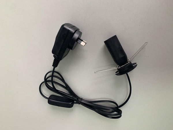 A black replacement power cord for electronics