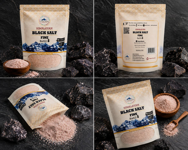 Himalayan Black Salt Fine Refill 300g by Crystal Mines Australia displayed with natural Himalayan black salt rocks in a premium lifestyle setting, highlighting the refill pouch and gourmet seasoning.