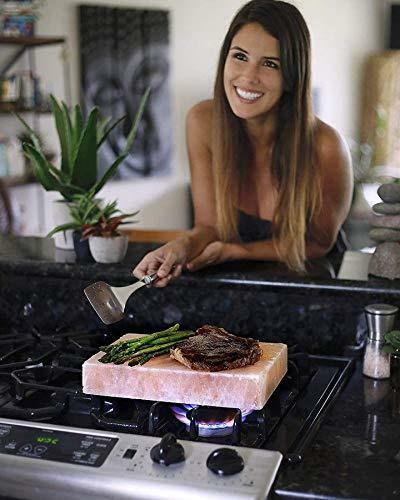 Premium Himalayan Salt Slab cooking a juicy steak on a BBQ grill with grilled vegetables, showcasing authentic Himalayan pink rock salt from Crystal Mines Australia.