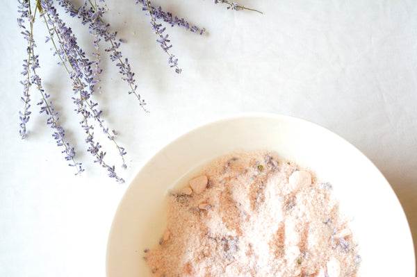 Mineral-rich Himalayan Pink Bath Salt with dried flowers for detox bath by Crystal Mines Australia.