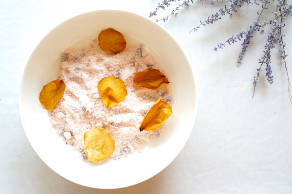 Mineral-rich Himalayan Pink Bath Salt with dried flowers for detox bath by Crystal Mines Australia.